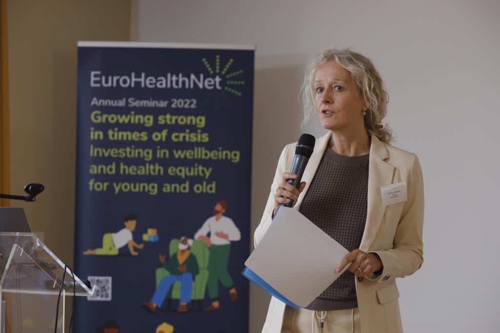 Caroline Costongs, Director of EuroHealthNet addresses participants during the Annual Seminar 'Growing strong in times of crisis'. 
